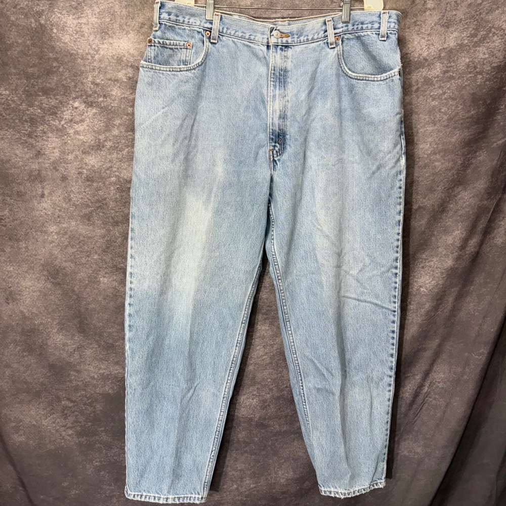 Vintage Levis 560 Loose Fit Tapered Leg Jeans Light Wash Blue 42x30 Made in USA